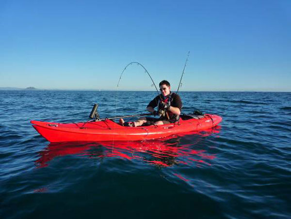 Kayak fisherman hooked up to a good fish